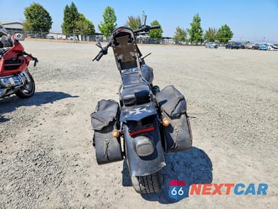 Czwarte zdjęcie samochodu z boku: 2010 HARLEY-DAVIDSON FLSTFB VIN:1HD1JN512AB011019 - miniatura