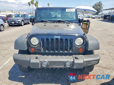 Piąte zdjęcie samochodu w środku: 2012 JEEP WRANGLER UNLIMITED SPORT VIN:1C4BJWDG6CL274256 - miniatura