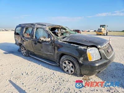 Czwarte zdjęcie samochodu z boku: 2011 GMC YUKON SLE VIN:1GKS1AE09BR214329 - miniatura
