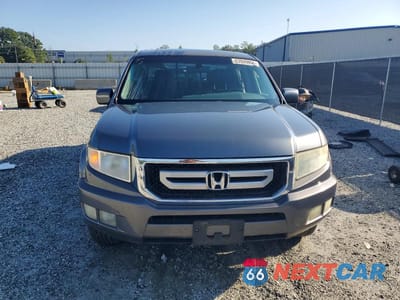 Piąte zdjęcie samochodu w środku: 2011 HONDA RIDGELINE RTL VIN:5FPYK1F52BB453067 - miniatura