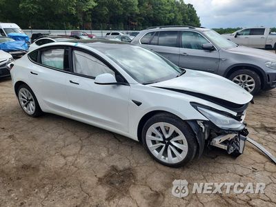 Czwarte zdjęcie samochodu z boku: 2023 TESLA MODEL 3 VIN:5YJ3E1EAXPF680507 - miniatura