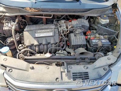 Zdjęcie 11 z 12 samochodu: 2010 HONDA INSIGHT EX VIN:JHMZE2H75AS007620 - miniatura