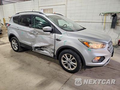 Czwarte zdjęcie samochodu z boku: 2018 FORD ESCAPE SE VIN:1FMCU9GD2JUC39599 - miniatura