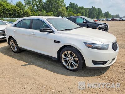 Czwarte zdjęcie samochodu z boku: 2014 FORD TAURUS SHO VIN:1FAHP2KT2EG106942 - miniatura