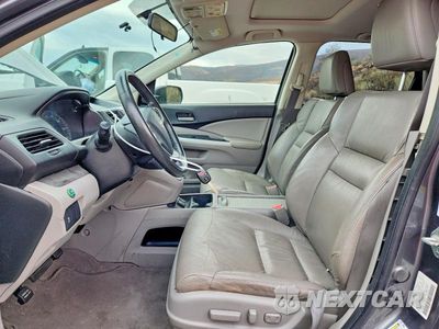 Zdjęcie 7 z 14 samochodu: 2012 HONDA CR-V EXL VIN:JHLRM4H77CC026668 - miniatura