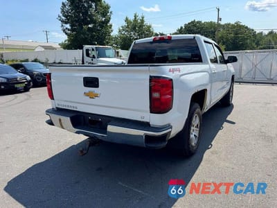 Trzecie zdjęcie samochodu z tyłu: 2016 CHEVROLET SILVERADO K1500 LT VIN:3GCUKREC5GG199801 - miniatura
