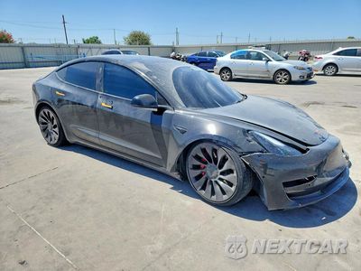 Czwarte zdjęcie samochodu z boku: 2022 TESLA MODEL 3 VIN:5YJ3E1EC2NF342226 - miniatura