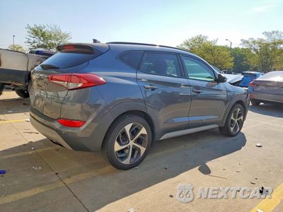 Trzecie zdjęcie samochodu z tyłu: 2018 HYUNDAI TUCSON VALUE VIN:KM8J33A2XJU808617 - miniatura
