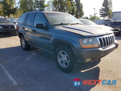 Czwarte zdjęcie samochodu z boku: 2001 JEEP GRAND CHEROKEE LAREDO VIN:1J4GX48S21C702810 - miniatura