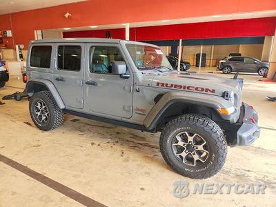 Czwarte zdjęcie samochodu z boku: 2021 JEEP WRANGLER UNLIMITED RUBICON VIN:1C4HJXFN1MW796403 - miniatura