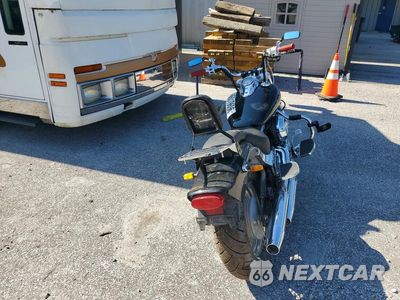 Czwarte zdjęcie samochodu z boku: 2000 YAMAHA XVS65 BASE VIN:JYAVM01E0YA018696 - miniatura