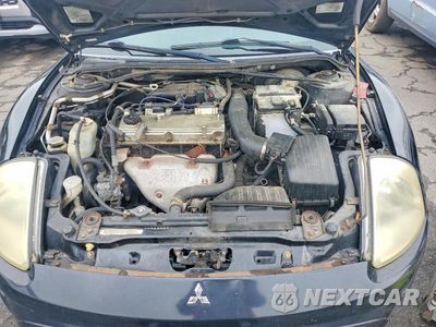 Zdjęcie 11 z 12 samochodu: 2003 MITSUBISHI ECLIPSE SPYDER GS VIN:4A3AE45G73E176213 - miniatura