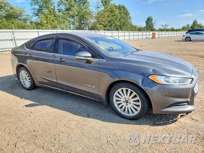 Czwarte zdjęcie samochodu z boku: 2016 FORD FUSION SE HYBRID VIN:3FA6P0LU3GR338853 - miniatura