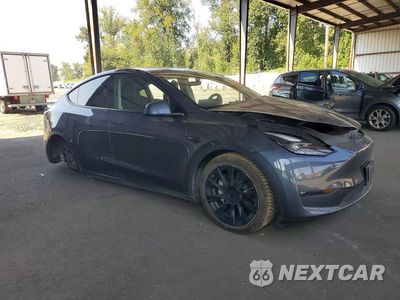 Czwarte zdjęcie samochodu z boku: 2023 TESLA MODEL Y VIN:7SAYGDEE9PF828668 - miniatura