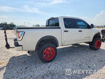 Trzecie zdjęcie samochodu z tyłu: 2011 NISSAN TITAN SV VIN:1N6BA0EC3BN316889 - miniatura