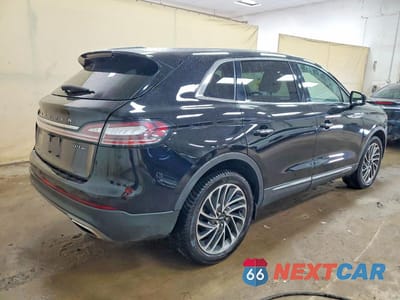 Trzecie zdjęcie samochodu z tyłu: 2019 LINCOLN NAUTILUS RESERVE VIN:2LMPJ8L92KBL40689 - miniatura