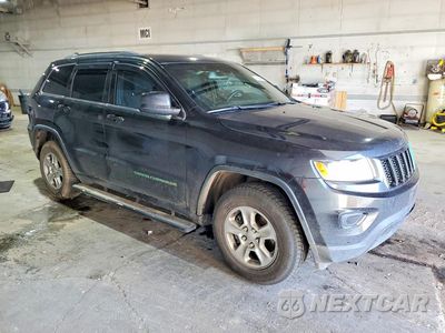 Czwarte zdjęcie samochodu z boku: 2016 JEEP GRAND CHEROKEE LAREDO VIN:1C4RJFAG8GC404269 - miniatura