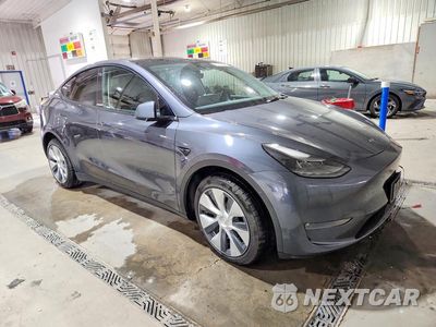 Czwarte zdjęcie samochodu z boku: 2023 TESLA MODEL Y VIN:7SAYGDEE1PF609607 - miniatura