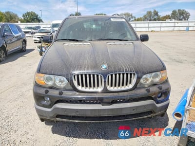 Piąte zdjęcie samochodu w środku: 2004 BMW X5 4.8IS VIN:5UXFA93524LE81412 - miniatura
