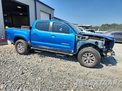Czwarte zdjęcie samochodu z boku: 2017 TOYOTA TACOMA SR5 V6 VIN:3TMAZ5CNXHM042912 - miniatura