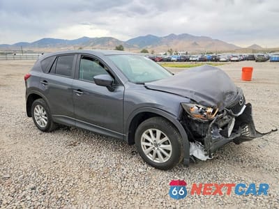 Czwarte zdjęcie samochodu z boku: 2014 MAZDA CX-5 TOURING VIN:JM3KE4CYXE0362631 - miniatura