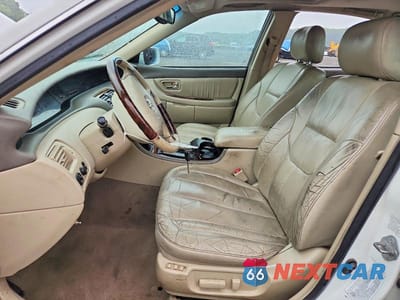 Zdjęcie 7 z 12 samochodu: 2003 TOYOTA AVALON XLS VIN:4T1BF28B93U331712 - miniatura