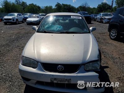 Piąte zdjęcie samochodu w środku: 2001 TOYOTA COROLLA LE VIN:2T1BR12E61C391546 - miniatura