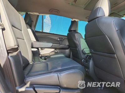 Zdjęcie 11 z 14 samochodu: 2022 HONDA PILOT TOURING VIN:5FNYF5H60NB020572 - miniatura
