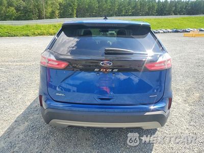 Zdjęcie 6 z 13 samochodu: 2023 FORD EDGE SEL VIN:2FMPK4J92PBA35527 - miniatura