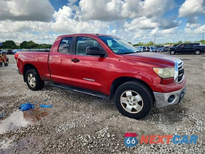 Czwarte zdjęcie samochodu z boku: 2011 TOYOTA TUNDRA DOUBLE CAB SR5 VIN:5TFRM5F12BX029406 - miniatura