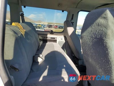 Zdjęcie 11 z 13 samochodu: 2007 FORD ECONOLINE E350 SUPER DUTY WAGON VIN:1FBNE31L37DA05024 - miniatura