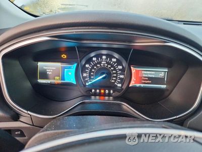 Zdjęcie 9 z 12 samochodu: 2014 FORD FUSION TITANIUM VIN:3FA6P0D90ER310953 - miniatura