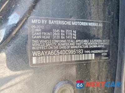 Zdjęcie 12 z 12 samochodu: 2013 BMW 740 I VIN:WBAYA6C54DC995183 - miniatura