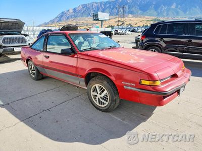 Czwarte zdjęcie samochodu z boku: 1989 PONTIAC SUNBIRD SE VIN:1G2JD11K2K7589761 - miniatura