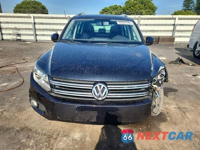 Piąte zdjęcie samochodu w środku: 2013 VOLKSWAGEN TIGUAN S VIN:WVGAV3AX8DW600900 - miniatura