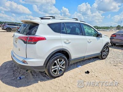 Trzecie zdjęcie samochodu z tyłu: 2018 TOYOTA RAV4 LE VIN:JTMBFREVXJD246323 - miniatura