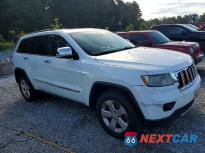 Czwarte zdjęcie samochodu z boku: 2013 JEEP GRAND CHEROKEE LIMITED VIN:1C4RJEBG7DC642506 - miniatura