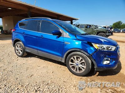 Czwarte zdjęcie samochodu z boku: 2017 FORD ESCAPE SE VIN:1FMCU0G91HUF02408 - miniatura