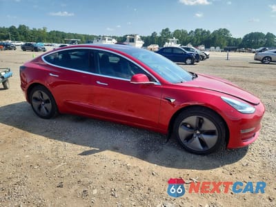 Czwarte zdjęcie samochodu z boku: 2018 TESLA MODEL 3 VIN:5YJ3E1EA1JF045683 - miniatura