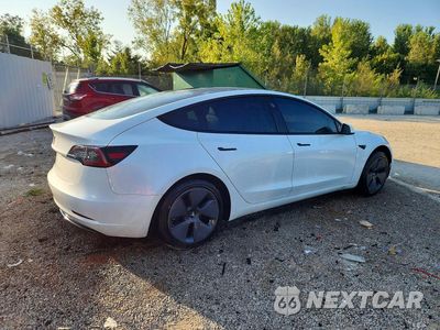 Trzecie zdjęcie samochodu z tyłu: 2023 TESLA MODEL 3 VIN:5YJ3E1EAXPF458405 - miniatura