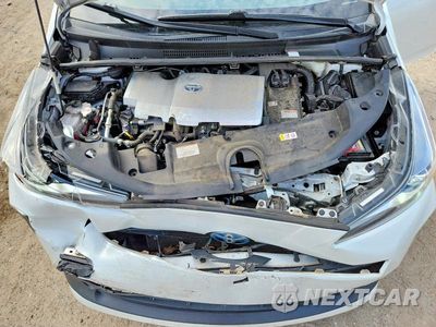 Zdjęcie 11 z 12 samochodu: 2021 TOYOTA PRIUS LE AWD-E VIN:JTDL9MFU7M3030797 - miniatura