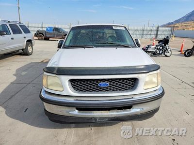 Piąte zdjęcie samochodu w środku: 1997 FORD F150 VIN:1FTDX1720VKD28461 - miniatura