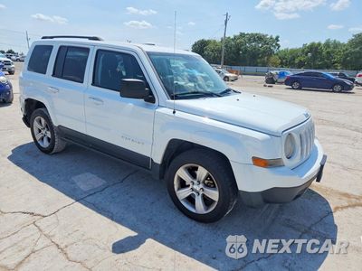 Czwarte zdjęcie samochodu z boku: 2014 JEEP PATRIOT LATITUDE VIN:1C4NJRFB0ED884604 - miniatura