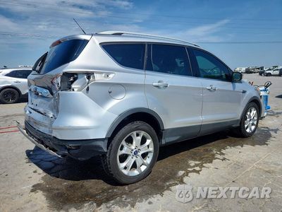 Trzecie zdjęcie samochodu z tyłu: 2014 FORD ESCAPE TITANIUM VIN:1FMCU0J94EUE51359 - miniatura