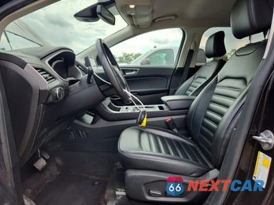 Zdjęcie 7 z 13 samochodu: 2021 FORD EDGE SEL VIN:2FMPK4J98MBA14578 - miniatura