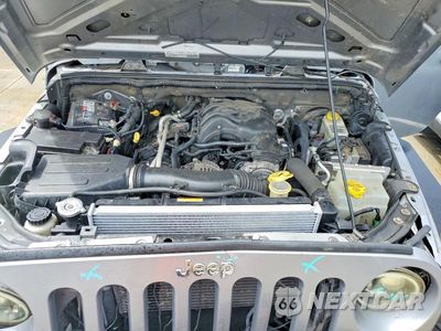 Zdjęcie 12 z 13 samochodu: 2015 JEEP WRANGLER UNLIMITED SPORT VIN:1C4BJWDG6FL503555 - miniatura