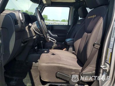 Zdjęcie 7 z 13 samochodu: 2013 JEEP WRANGLER UNLIMITED SAHARA VIN:1C4BJWEG1DL658395 - miniatura