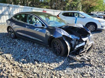 Czwarte zdjęcie samochodu z boku: 2020 TESLA MODEL 3 VIN:5YJ3E1EB3LF663874 - miniatura
