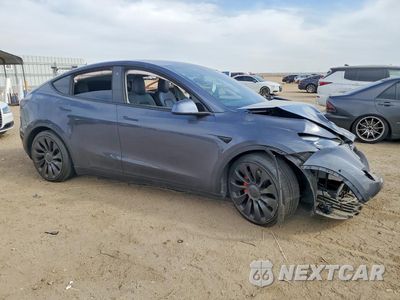 Czwarte zdjęcie samochodu z boku: 2022 TESLA MODEL Y VIN:7SAYGDEF7NF326764 - miniatura