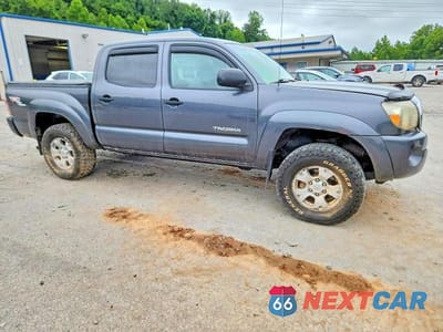 Czwarte zdjęcie samochodu z boku: 2009 TOYOTA TACOMA V6 VIN:5TELU42N89Z621288 - miniatura